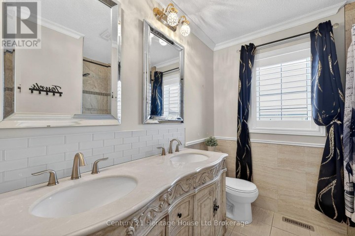 Photo 28 at 717 Normandy Drive, Woodstock - North, Woodstock
