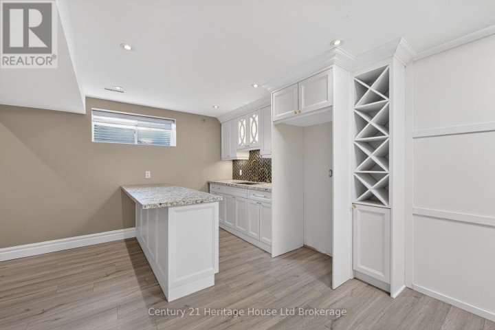 Photo 33 at 717 Normandy Drive, Woodstock - North, Woodstock
