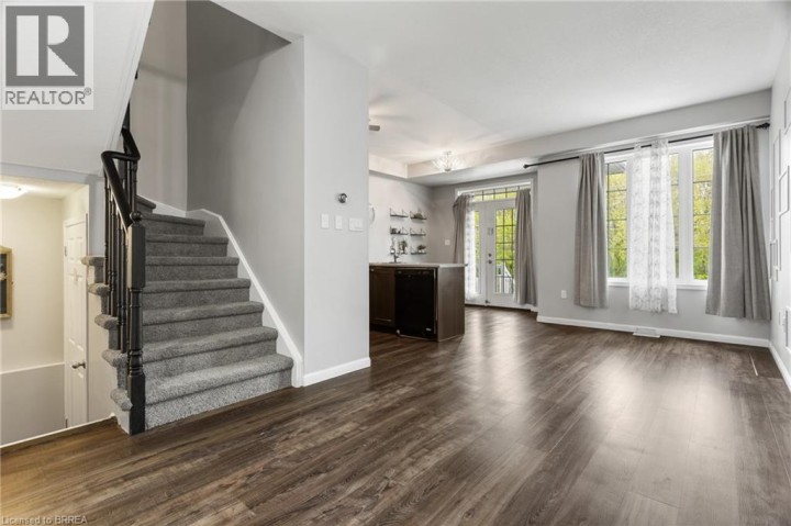 Photo 1 at 32 - 21 Diana Avenue, Empire, Brantford