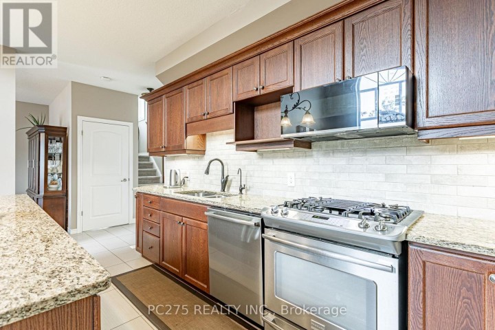 Photo 10 at 832 Normandy Drive, Woodstock - North, Woodstock