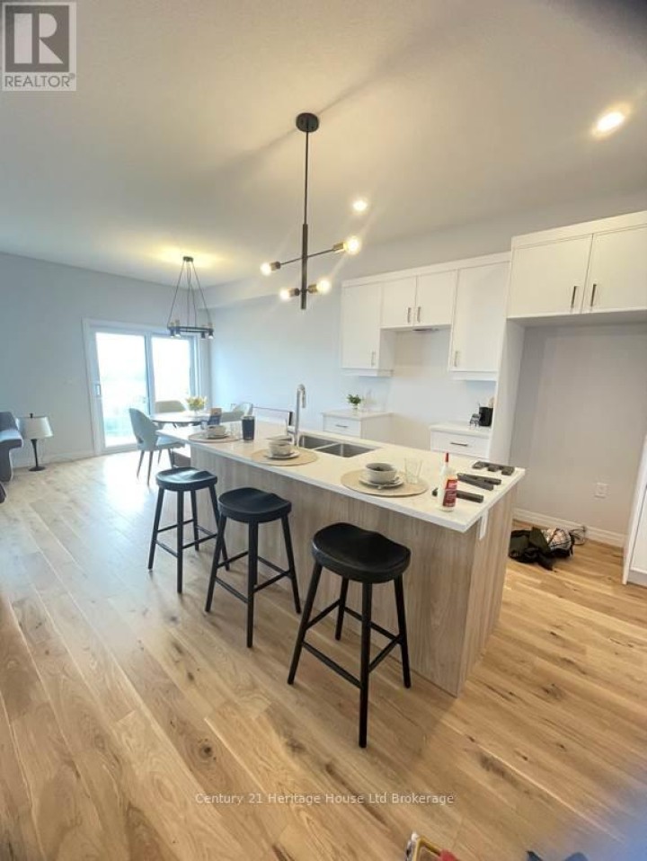 Photo 6 at 335 Kading Crescent, Woodstock - South, Woodstock