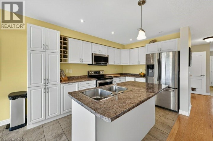 Photo 25 at 557 Baldwin Crescent, Woodstock - North, Woodstock