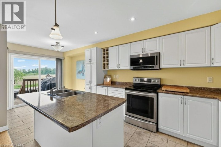 Photo 27 at 557 Baldwin Crescent, Woodstock - North, Woodstock