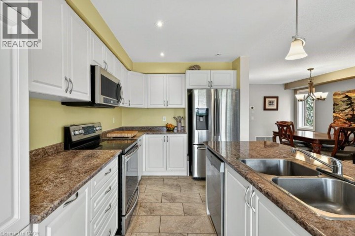 Photo 30 at 557 Baldwin Crescent, Woodstock - North, Woodstock