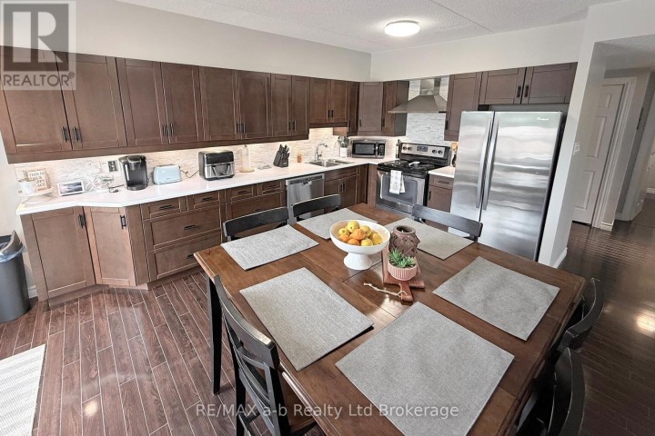 Photo 10 at 303 - 159 Ferguson Drive, Woodstock - South, Woodstock