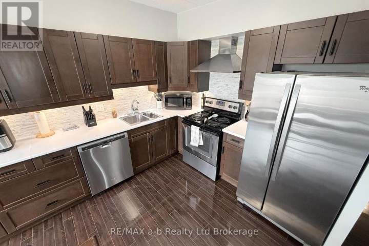Photo 11 at 303 - 159 Ferguson Drive, Woodstock - South, Woodstock