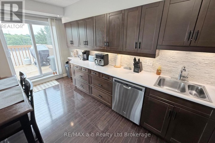 Photo 12 at 303 - 159 Ferguson Drive, Woodstock - South, Woodstock