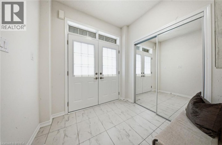 Photo 3 at 109 Longboat Run, Empire South, Brantford