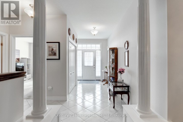 Photo 9 at 619 Fox Hollow Court, Woodstock - North, Woodstock