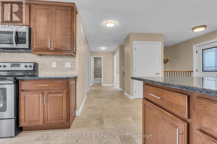 Photo 7 at 54 Pebble Beach Court, Woodstock - South, Woodstock