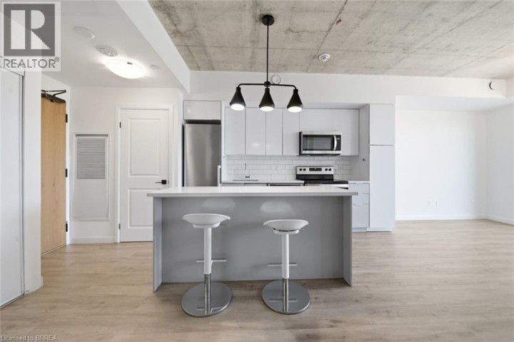 Photo 2 at 202 - 7 Erie Avenue, Eagle Place East, Brantford