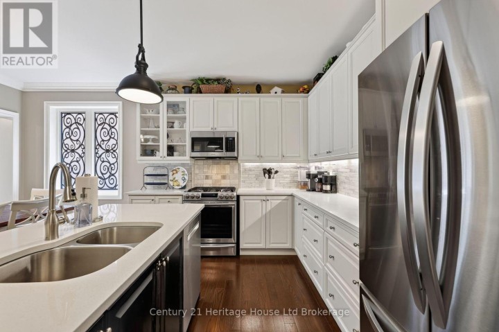 Photo 12 at 528 Baldwin Crescent, Woodstock - North, Woodstock