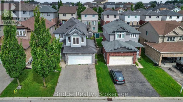 Photo 1 at 880 Frontenac Crescent, Woodstock - South, Woodstock