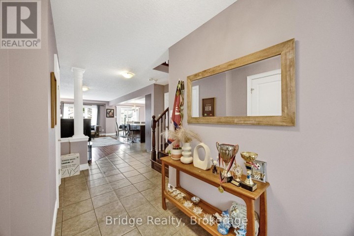 Photo 11 at 880 Frontenac Crescent, Woodstock - South, Woodstock