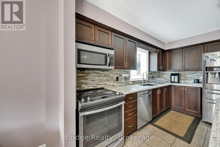 Photo 20 at 880 Frontenac Crescent, Woodstock - South, Woodstock