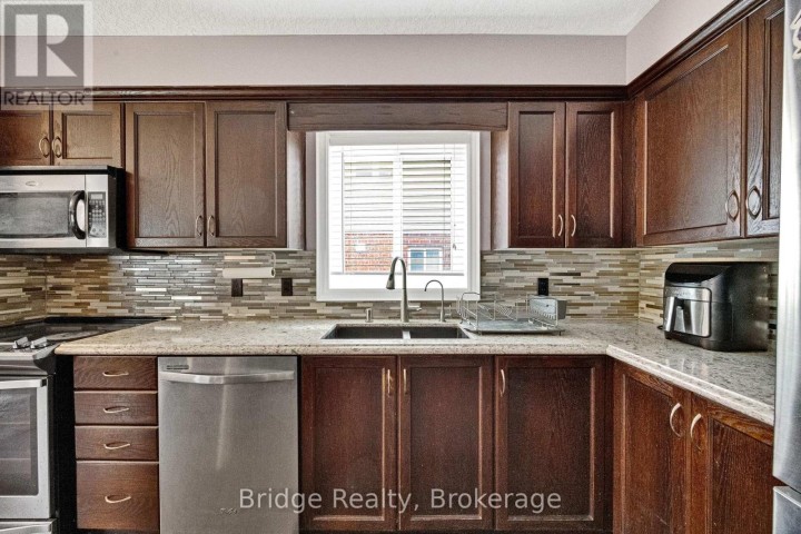 Photo 22 at 880 Frontenac Crescent, Woodstock - South, Woodstock