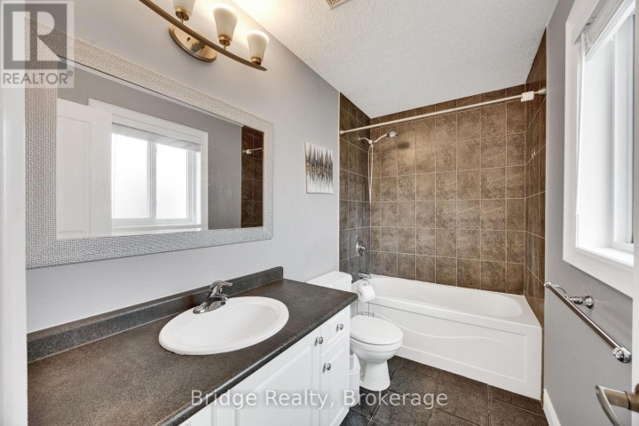 Photo 36 at 880 Frontenac Crescent, Woodstock - South, Woodstock