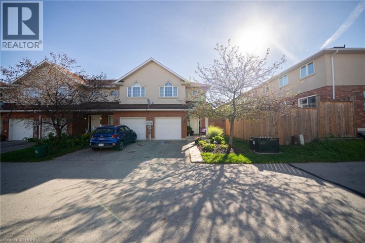 Photo 2 at 67 - 20 McConkey Crescent, Echo Place, Brantford