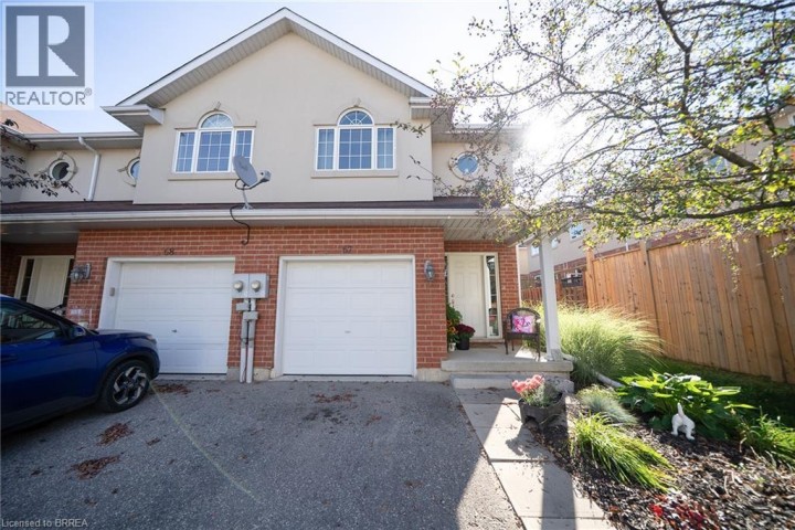 Photo 3 at 67 - 20 McConkey Crescent, Echo Place, Brantford