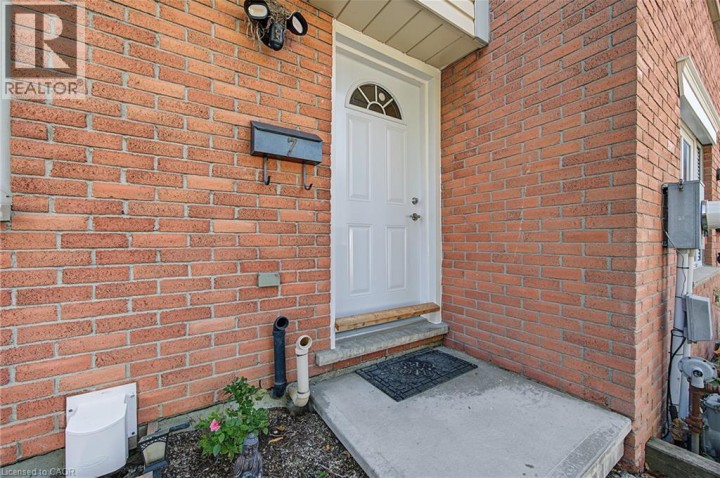 Photo 1 at 7 - 125 Bay Street, Woodstock - South, Woodstock