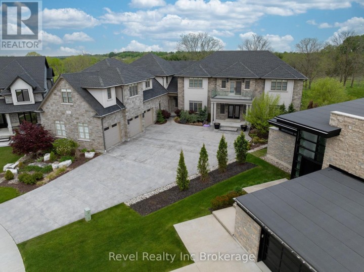 Photo 1 at 241 Tamarack Boulevard, Woodstock - North, Woodstock