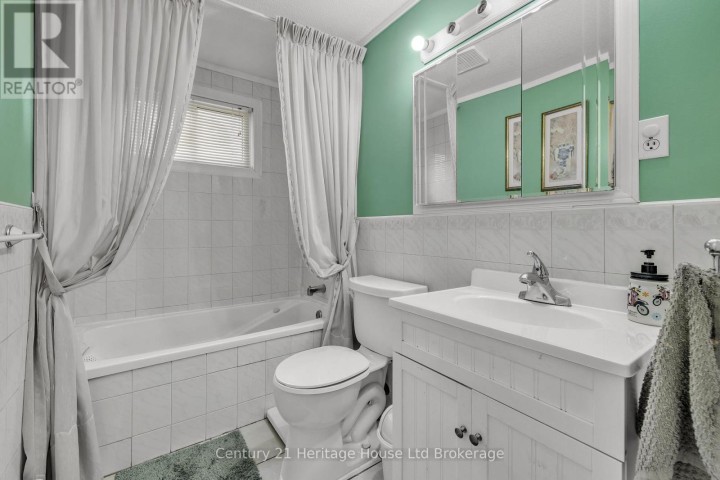 Photo 14 at 921 Lincoln Drive, Woodstock - South, Woodstock