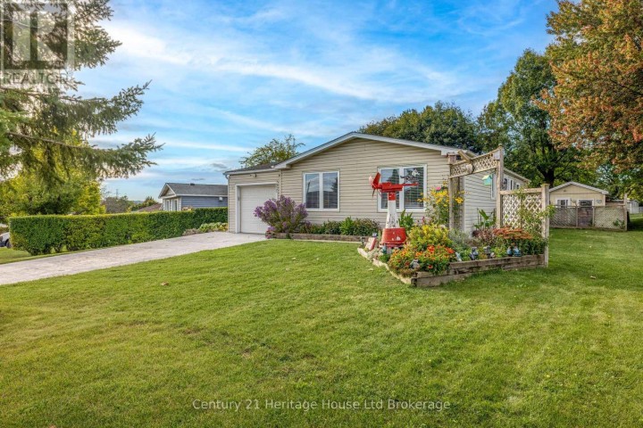 Photo 1 at 921 Lincoln Drive, Woodstock - South, Woodstock