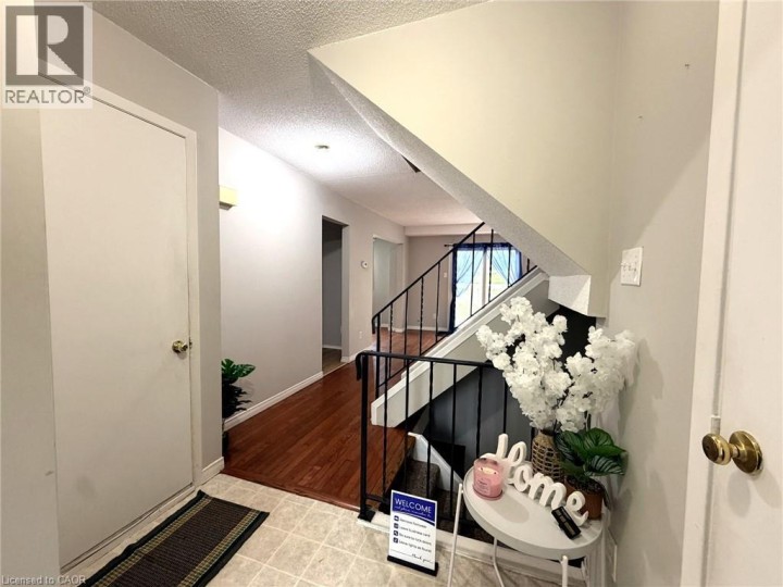 Photo 2 at 6 - 195 Ferguson Drive, Woodstock - South, Woodstock