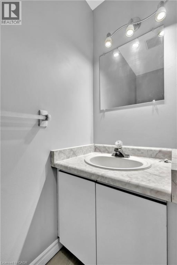 Photo 12 at 2 - 1135 Nellis Street, Woodstock - North, Woodstock