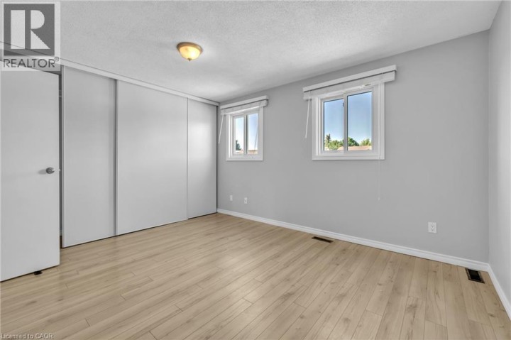 Photo 13 at 2 - 1135 Nellis Street, Woodstock - North, Woodstock
