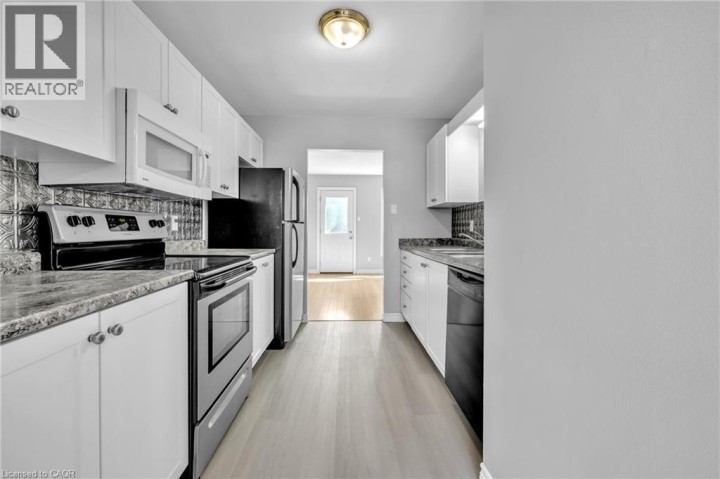 Photo 10 at 2 - 1135 Nellis Street, Woodstock - North, Woodstock