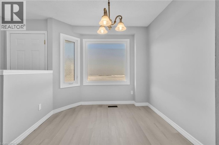 Photo 11 at 2 - 1135 Nellis Street, Woodstock - North, Woodstock