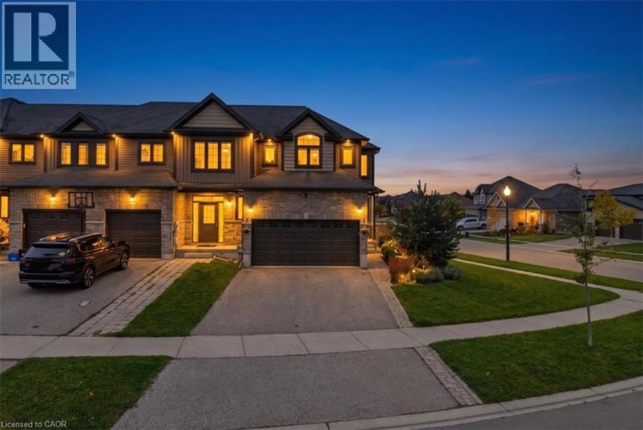 Photo 1 at 100 Links Crescent, Woodstock - North, Woodstock