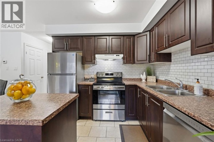 Photo 8 at 113 - 20 McConkey Crescent, Echo Place, Brantford