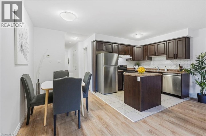 Photo 6 at 113 - 20 McConkey Crescent, Echo Place, Brantford