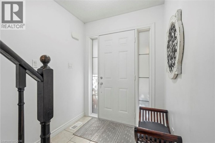 Photo 3 at 113 - 20 McConkey Crescent, Echo Place, Brantford