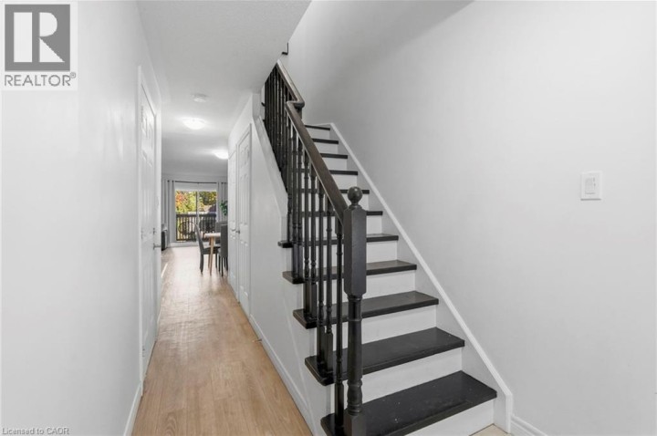 Photo 4 at 113 - 20 McConkey Crescent, Echo Place, Brantford