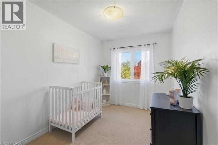 Photo 20 at 113 - 20 McConkey Crescent, Echo Place, Brantford