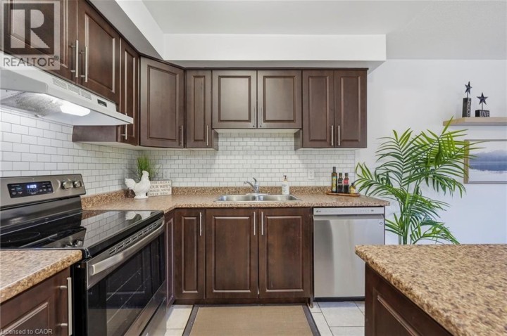 Photo 7 at 113 - 20 McConkey Crescent, Echo Place, Brantford