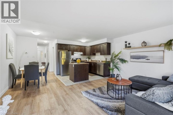 Photo 5 at 113 - 20 McConkey Crescent, Echo Place, Brantford