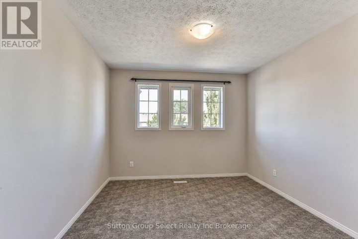 Photo 22 at 1106 Nellis Street, Woodstock - North, Woodstock